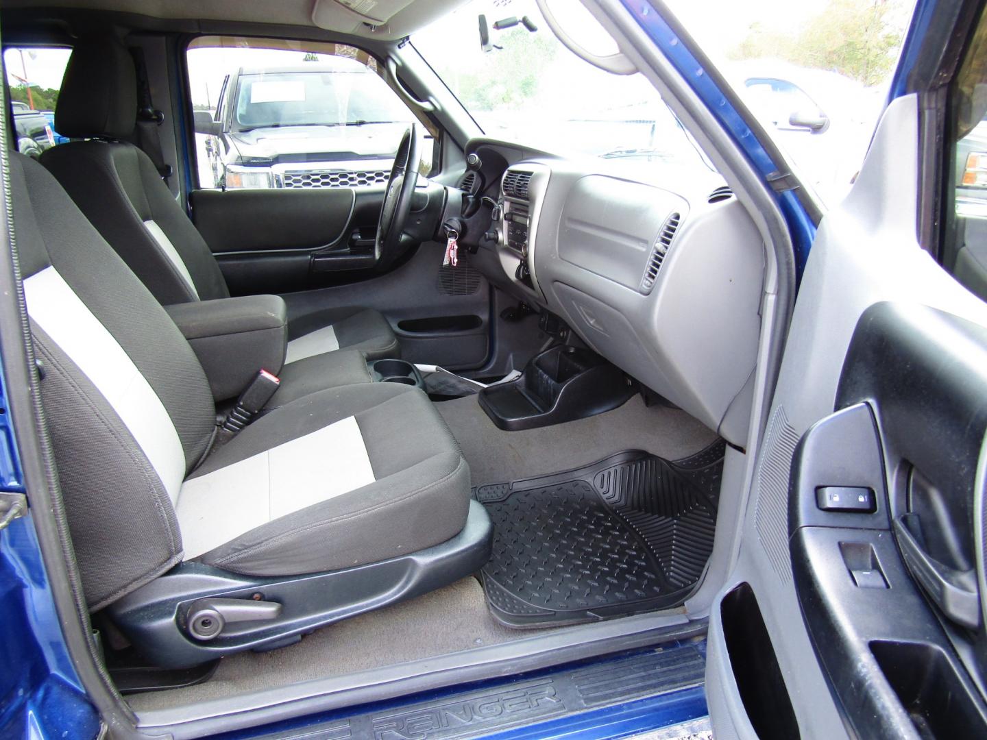 2010 Blue /Black Ford Ranger Sport SuperCab 4-Door 4WD (1FTLR4FE6AP) with an 4.0L V6 SOHC 12V engine, Automatic transmission, located at 15016 S Hwy 231, Midland City, AL, 36350, (334) 983-3001, 31.306210, -85.495277 - Photo#8